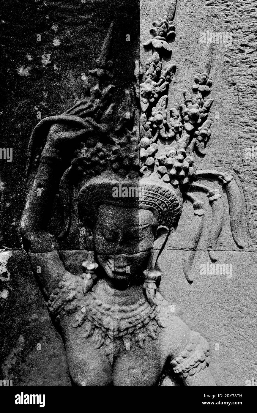 Ancient statue in Angkor Cambodia Stock Photo