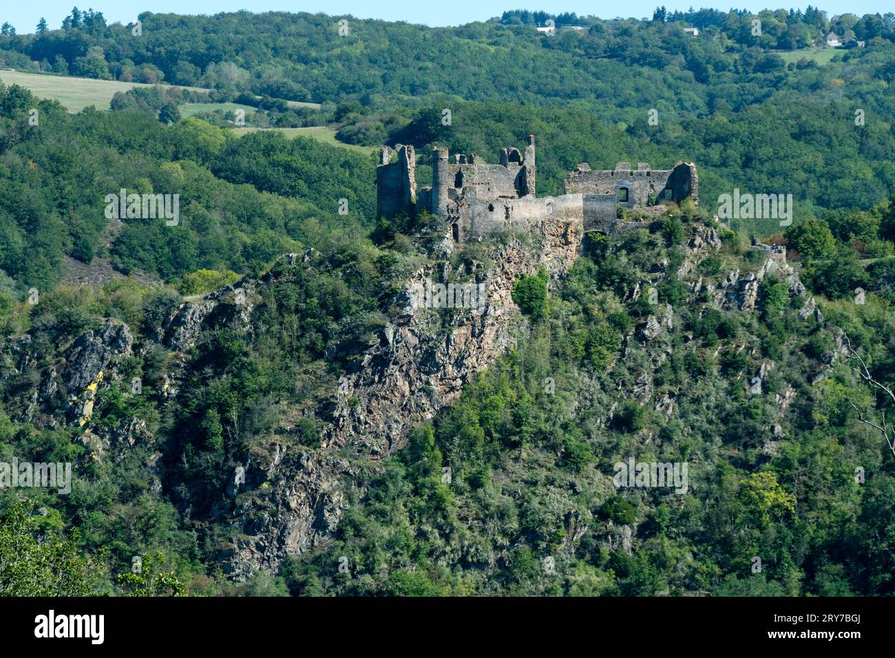 Village of Saint-Remy-de-Biot, the medieval castle in ruins of Chateau Rocher (15th century) overlooks the soul valley, Puy de Dome, Auvergne, France Stock Photo