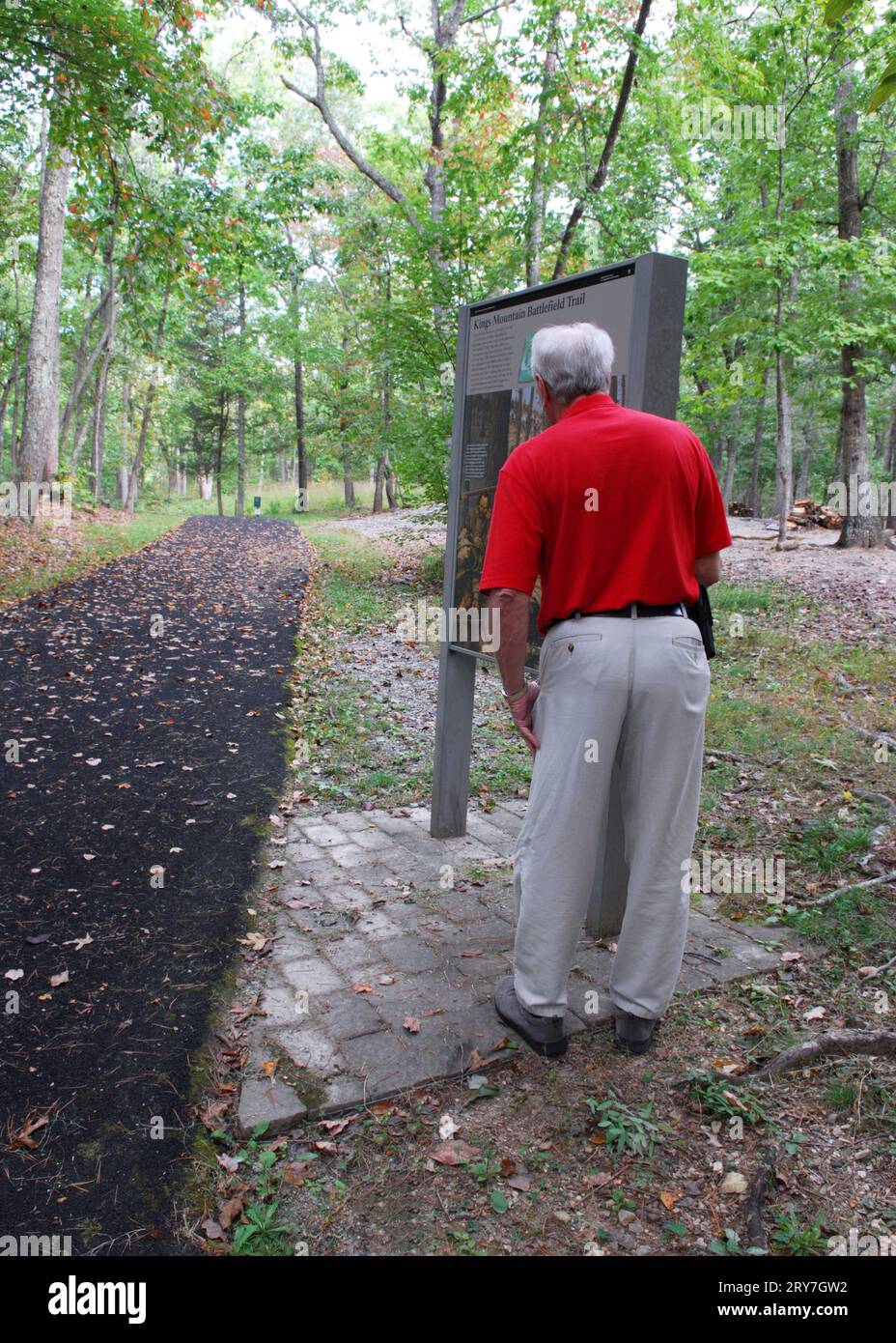 Photo shows senior man viewing the information sign at the Kings Mountain National Military Park, South Carolina USA. Stock Photo