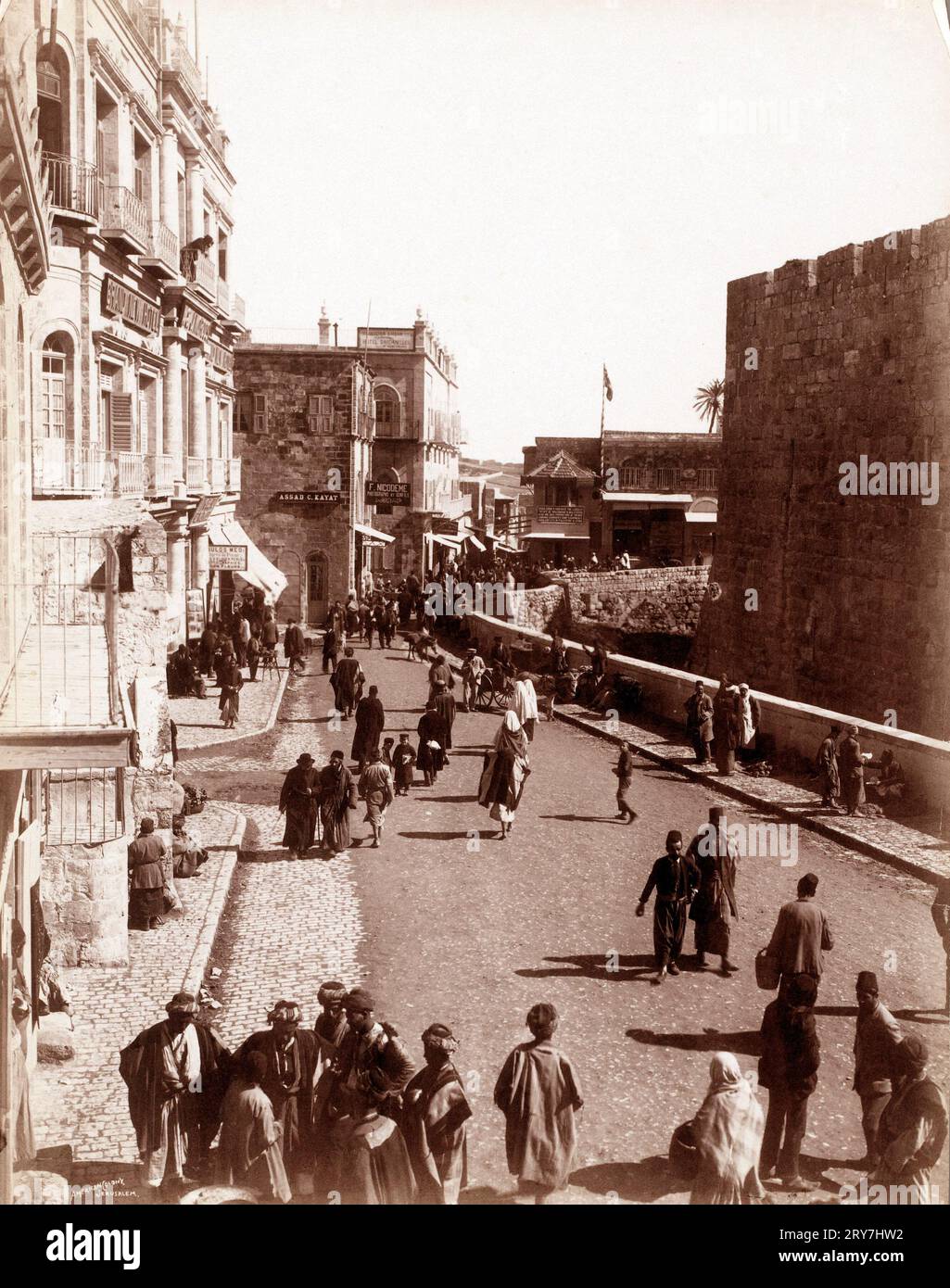 A view of David Street in Jerusalem, in the distance the photo shop of F. Nicodeme, American Colony, 1898 - 1910 Stock Photo