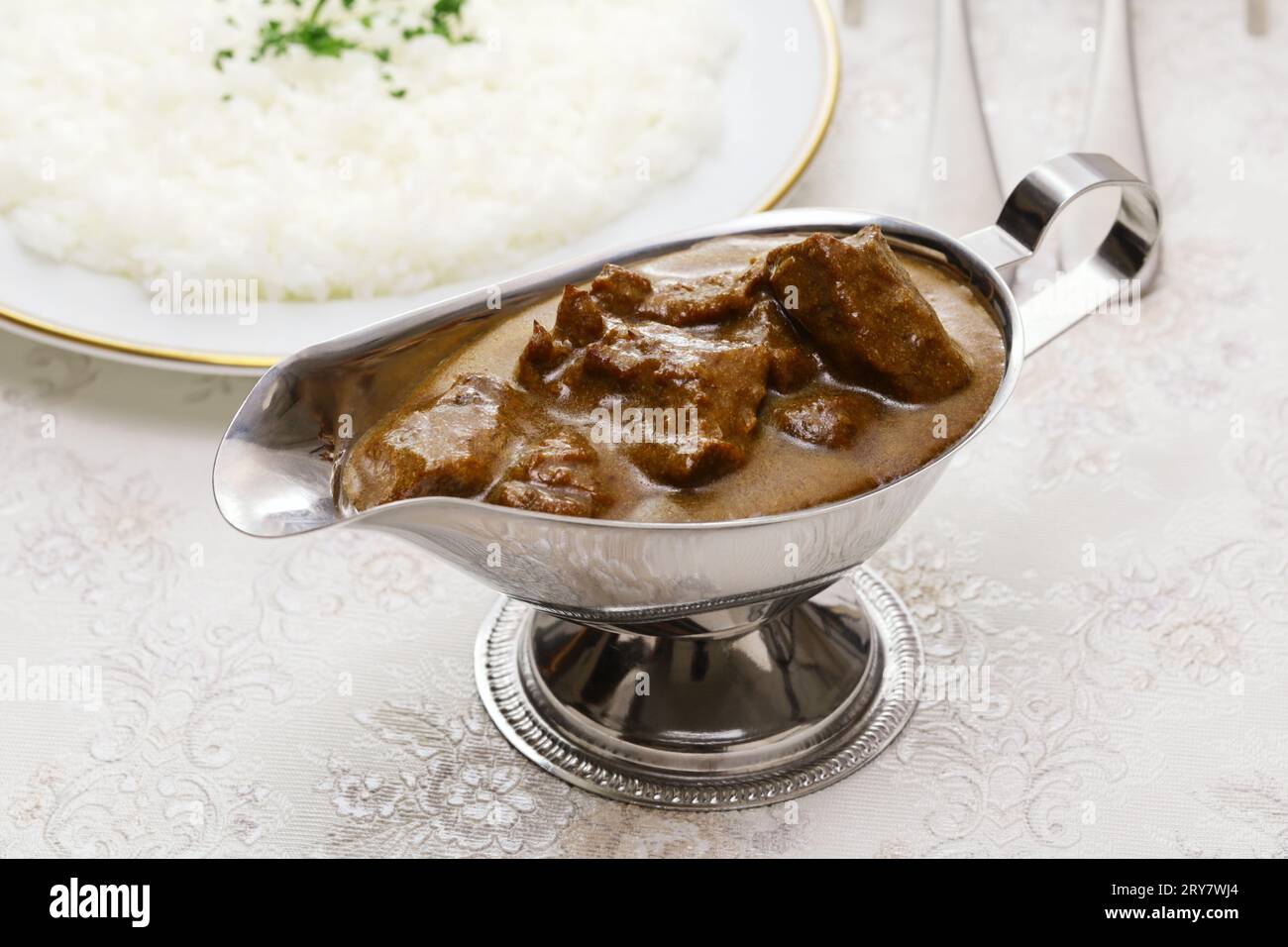 Japanese-style beef curry rice ( curry and rice are served separately) Japanese curry is always served with rice. Stock Photo