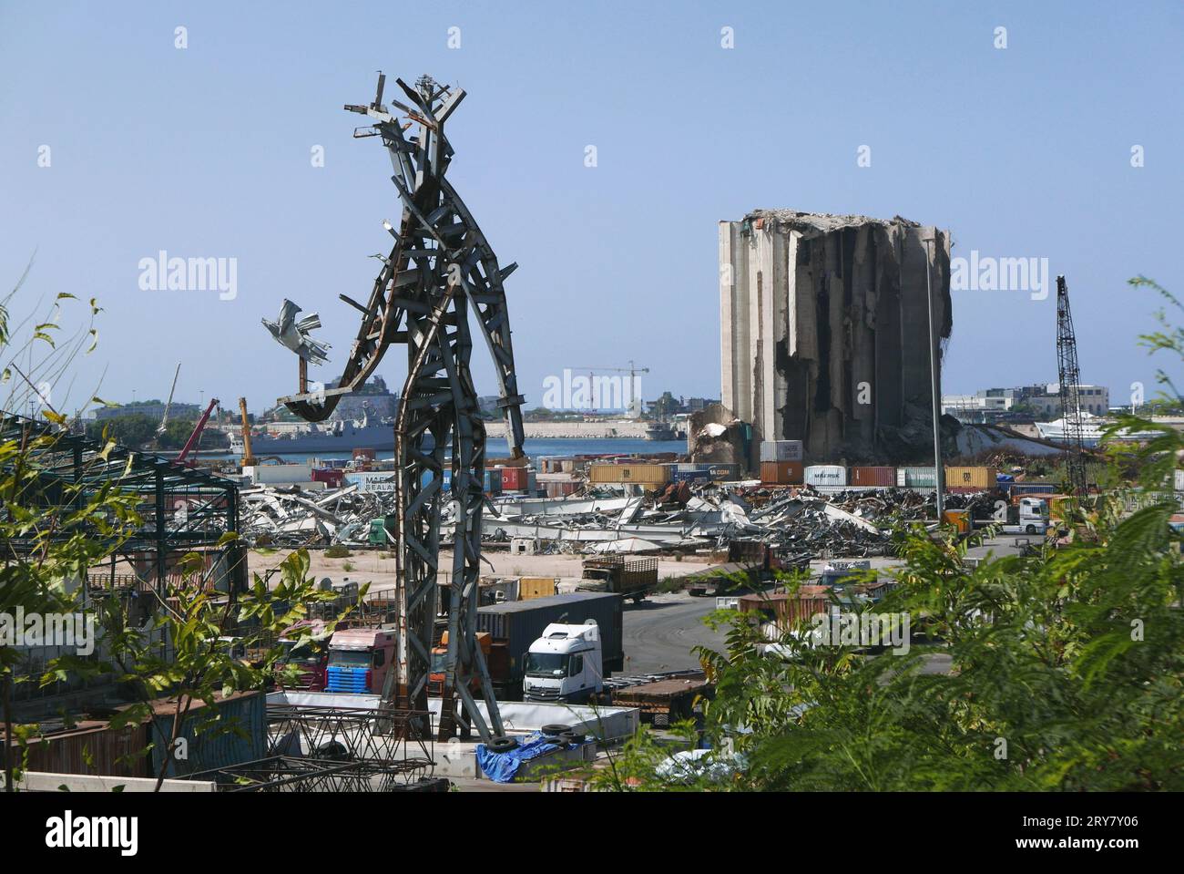 Beirut, Lebanon. 29th Sep, 2023. A shot of the port of Beirut, Lebanon, on September 29 2023. On the right of the picture, the remains of grain silos ravaged by the massive explosion of August 4 2020; on the left, the monument built in memory of the victims. (Photo by Elisa Gestri/Sipa USA) Credit: Sipa USA/Alamy Live News Stock Photo