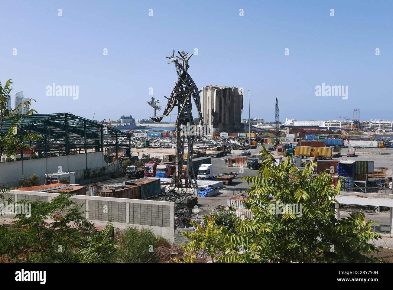 Beirut, Lebanon. 29th Sep, 2023. A shot of the port of Beirut, Lebanon, on September 29 2023. On the background, the remains of grain silos ravaged by the massive explosion of August 4 2020; on the foreground, the monument buit in memory of the victims. (Photo by Elisa Gestri/Sipa USA) Credit: Sipa USA/Alamy Live News Stock Photo