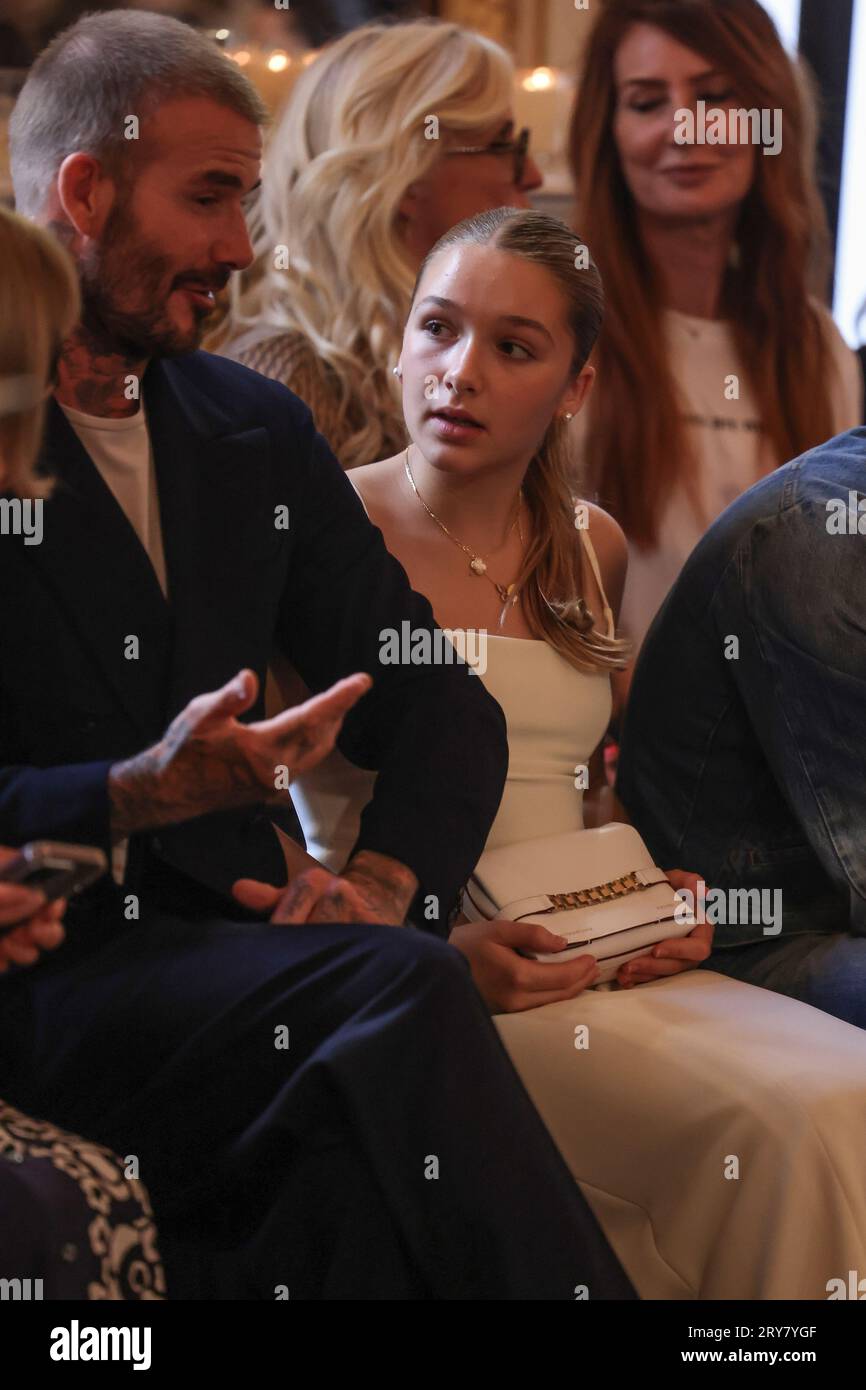 David Beckham, left, and Harper Beckham attend the Victoria Beckham
