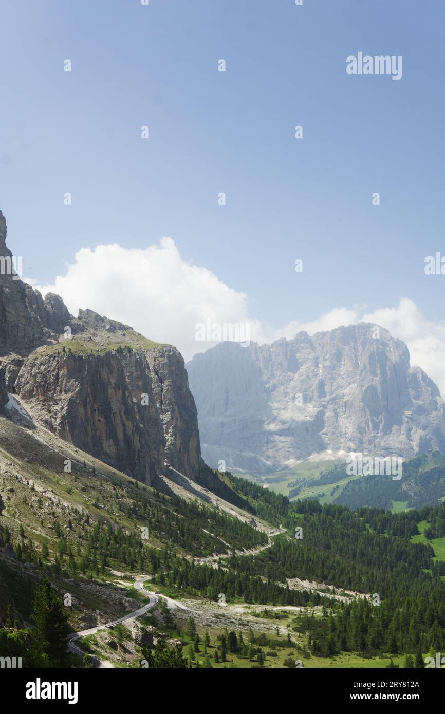 Wide angle of a road in the Dolomites mountains Stock Photo