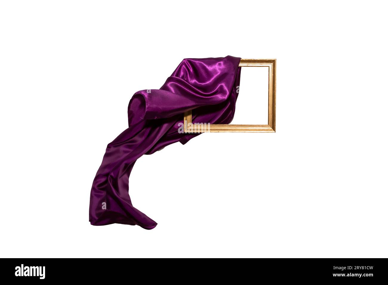 Flying purple satin cloth unveiling a golden frame. Levitating frame, mockup for presentation or display. Stock Photo