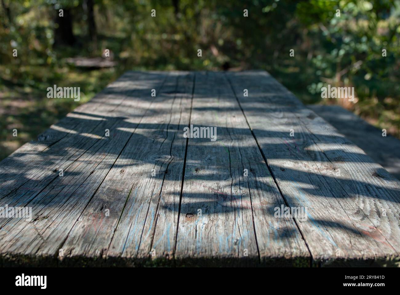 Empty weathered wood boards table, perspective side  view Stock Photo