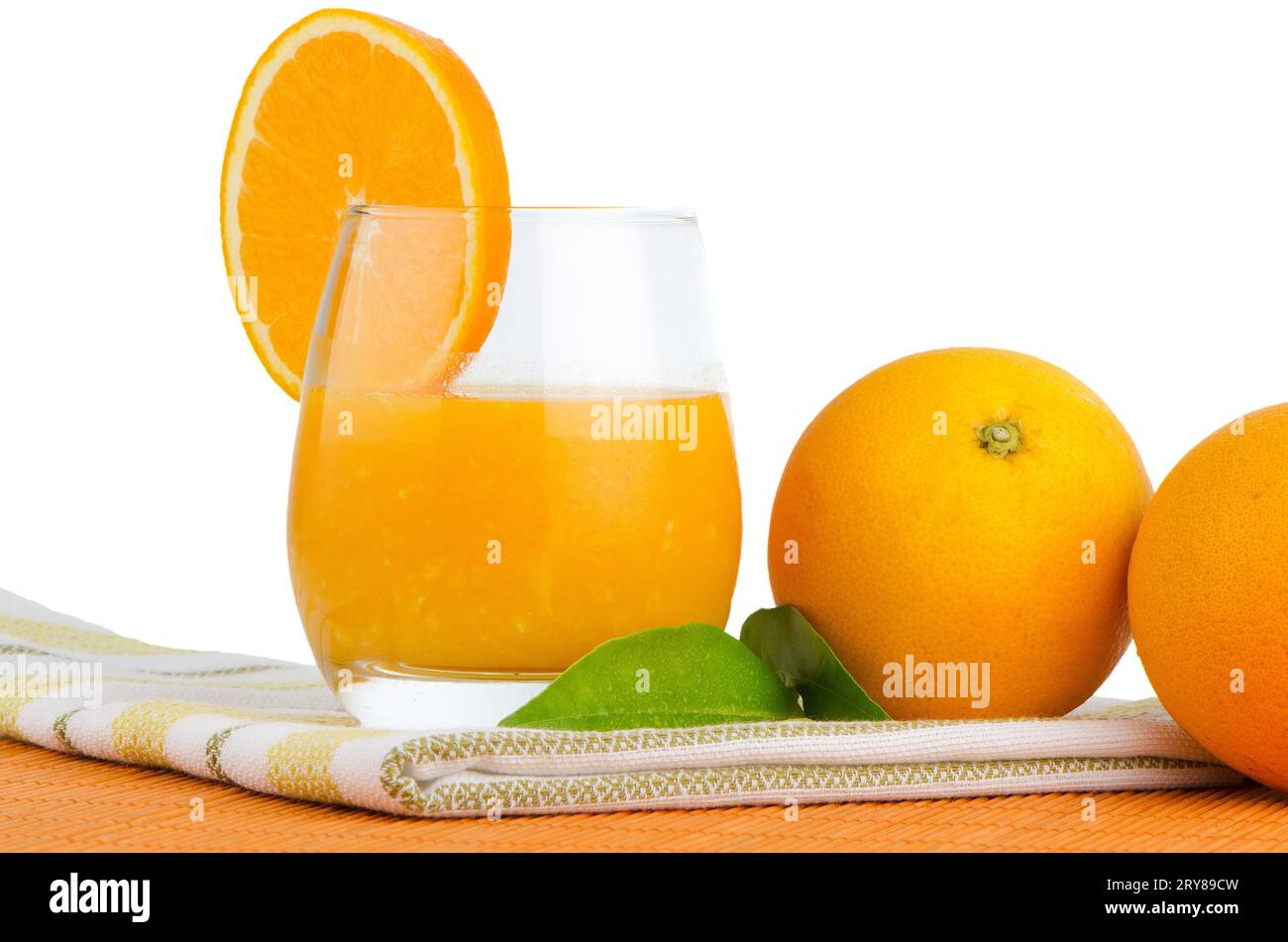 Cup of orange juice and fresh orange Stock Photo Alamy