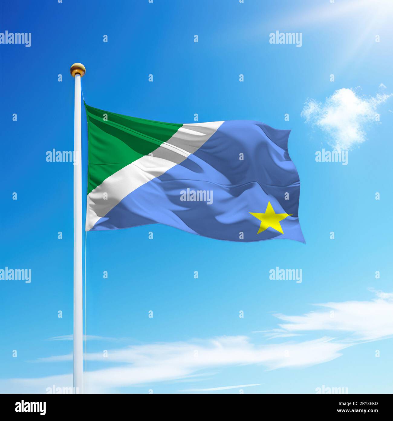 Waving flag of Mato Grosso do Sul is a state of Brazil on flagpole with sky background. Stock Photo