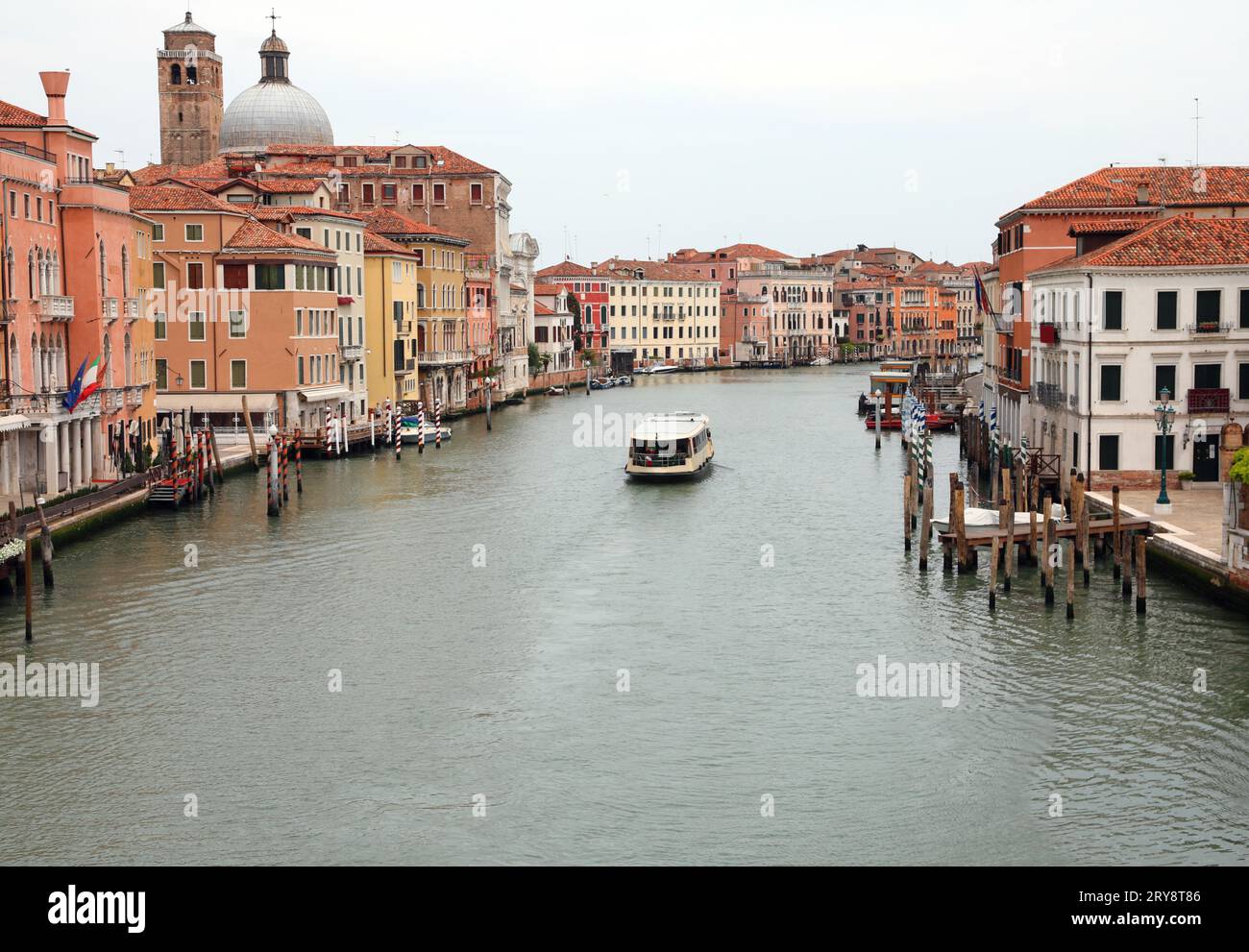 Waterway called CANAL GRANDE in Venice in Italy with only a boat VAPORETTO during italian lockdown Stock Photo