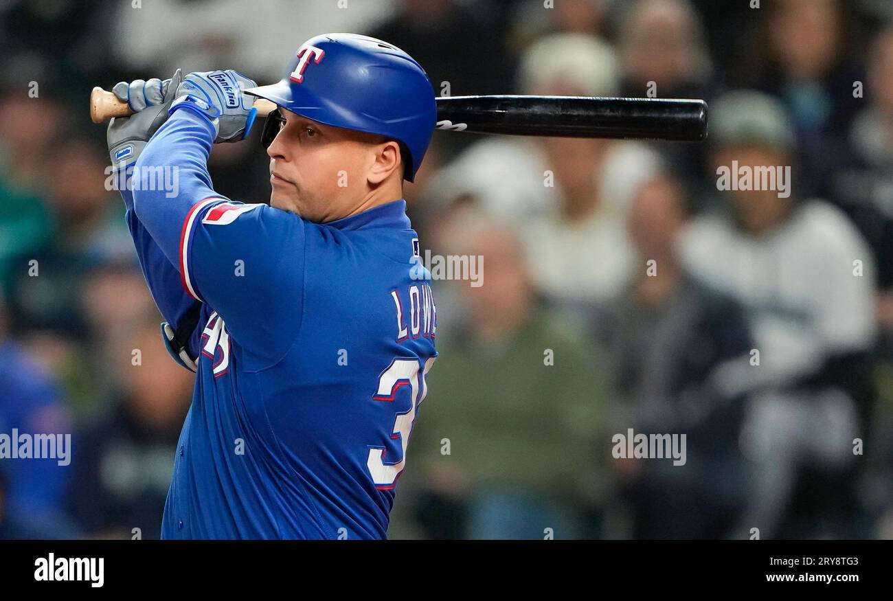 Texas Rangers' Nathaniel Lowe follows through on a swing during a baseball  game against the New York Yankees, Thursday, April 27, 2023, in Arlington,  Texas. (AP Photo/Tony Gutierrez Stock Photo - Alamy