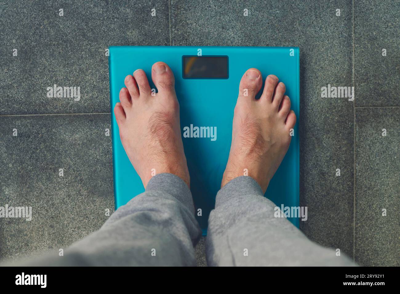 Male Feet Glass Scales Men's Diet Body Weight Close Stock Photo by  ©YAYImages 323776374