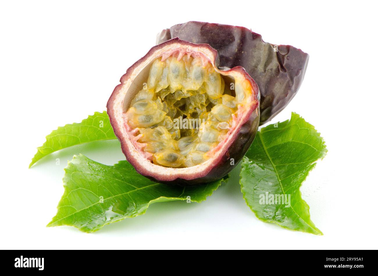 Half passion fruit seeds hi-res stock photography and images - Alamy