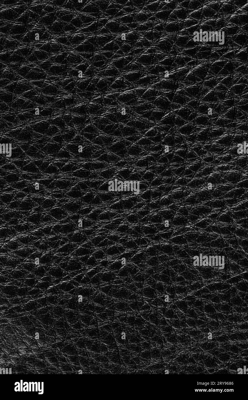 Natural qualitative black leather texture. Close up. Stock Photo