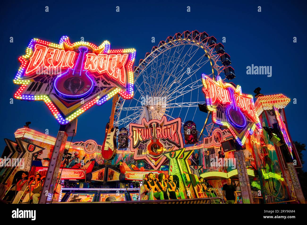 Ferris wheel, ride, Cannstatter Volksfest, Wasen, Cannstatt, evening, blue hour, motion effect, LED, Stuttgart, Baden-Wuerttemberg, Germany Stock Photo