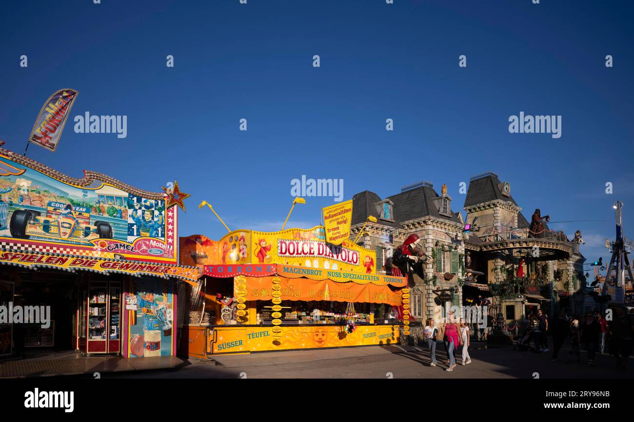 Ride, food, ghost train, sky, blue, Cannstatter Volksfest, Wasen, Cannstatt, Stuttgart, Baden-Wuerttemberg, Germany Stock Photo