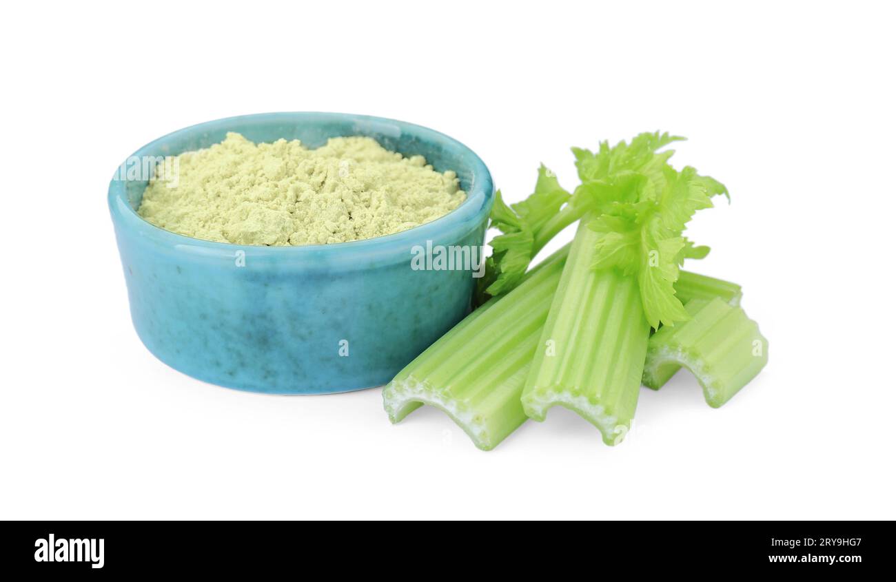 Celery powder and fresh cut stalks isolated on white Stock Photo Alamy