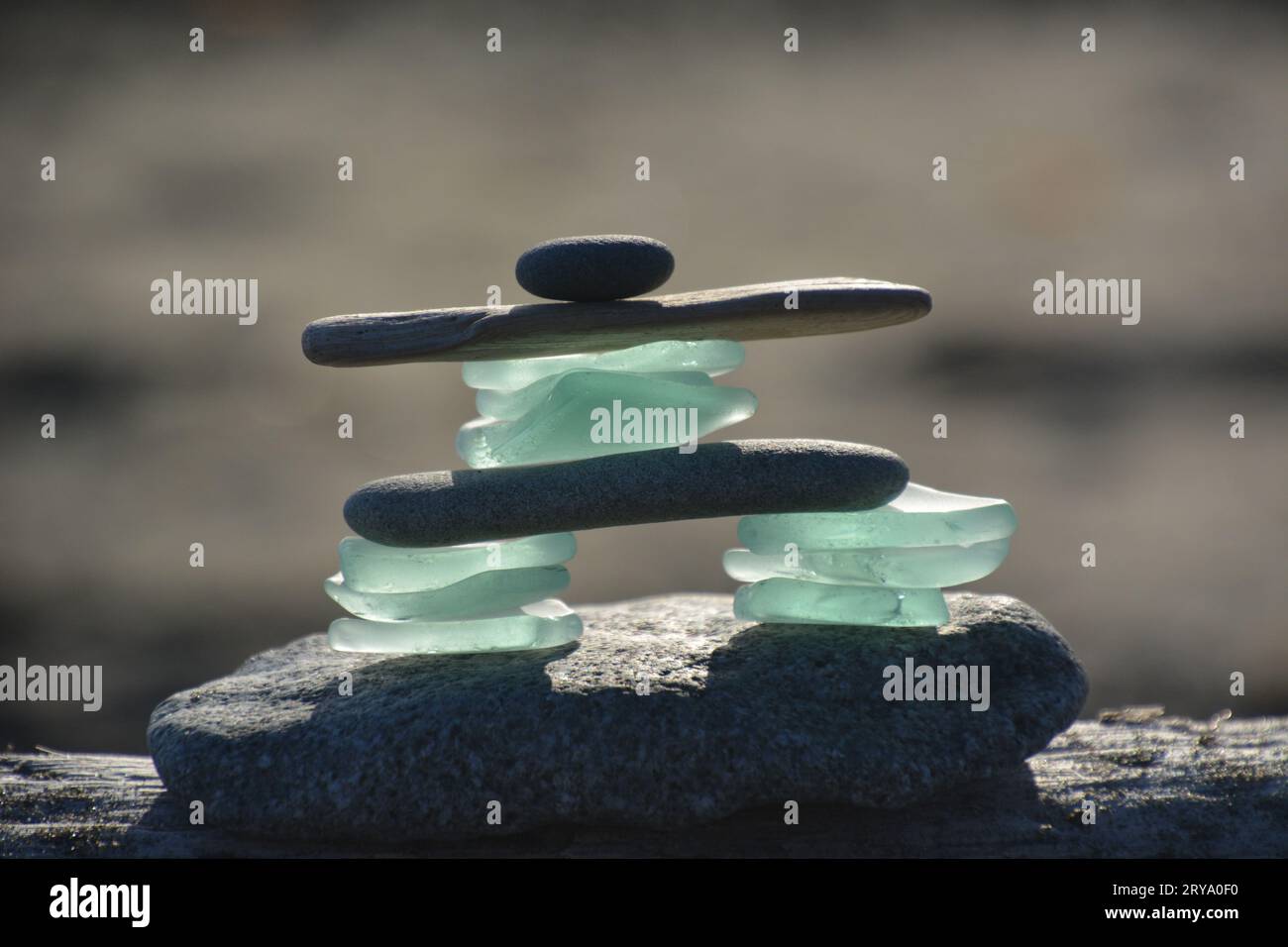 Glass and Driftwood Yoga Stock Photo Alamy