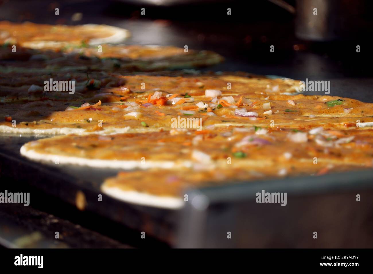Masala Dosa, a major South Indian street food dish being prepared in a