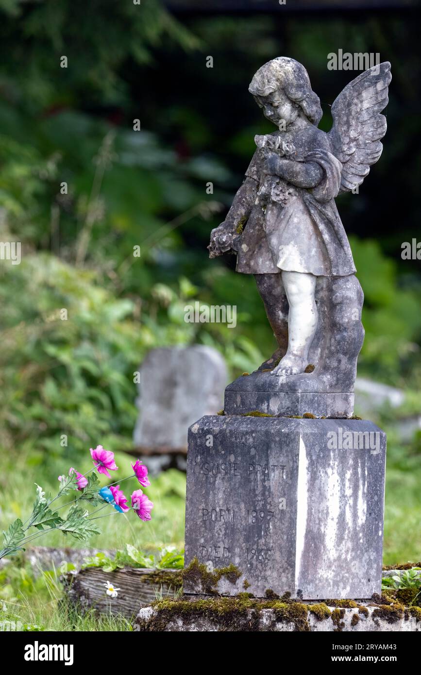 Angel statue in Hoonah Cemetery or Icy Strait Cemetery - Icy Strait Point, Hoonah, Alaska, USA Stock Photo