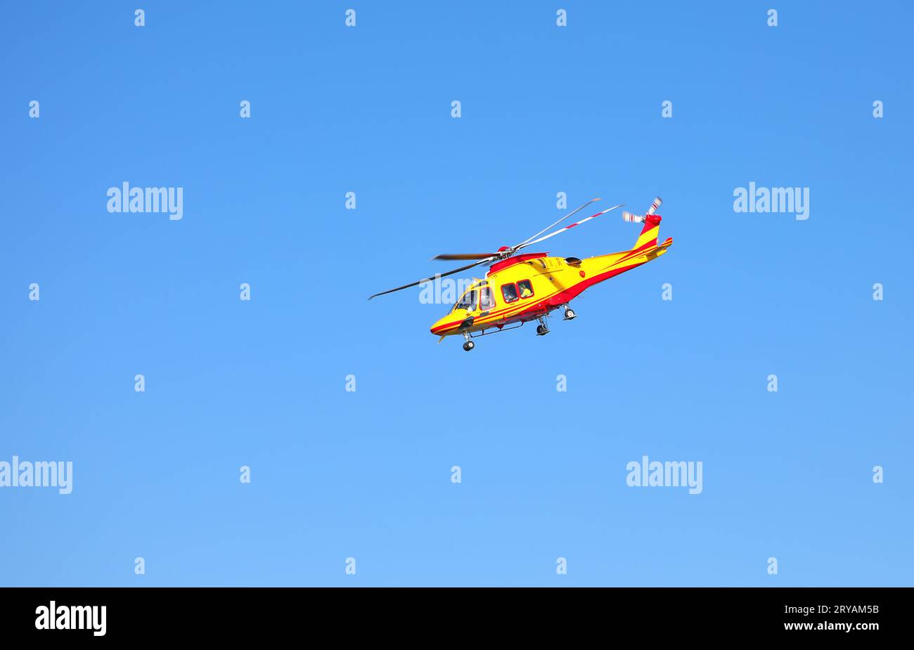 Roma, RM, Italy - July 2, 2023: Yellow helicopter rescue used as air ambulance during operation Stock Photo
