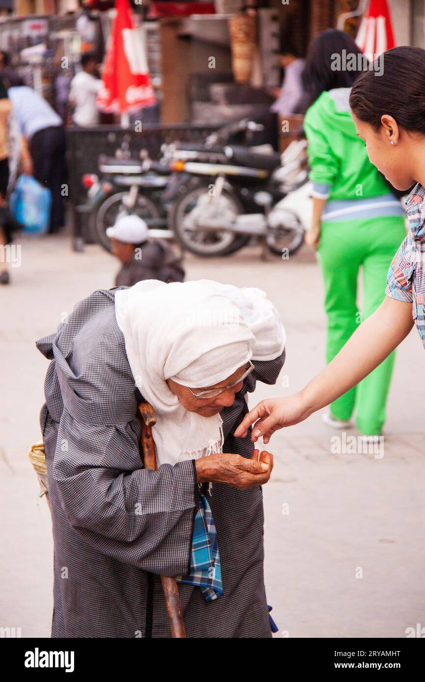 elderly beggar lady in Marrakech Morocco March 2012 Stock Photo