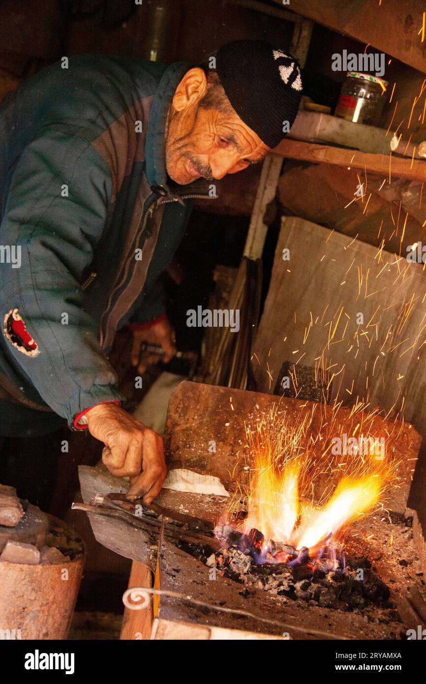 Berber local lighting fire in Morocco March 2012 Stock Photo