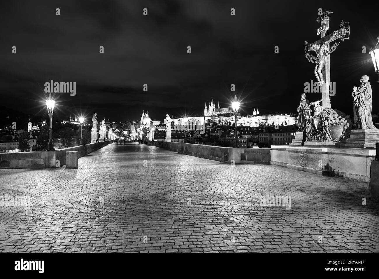 Prague Castle and Lesser Qaurter view from Charles Bridge by night, Prague, Czech Republic Black and white image. Stock Photo