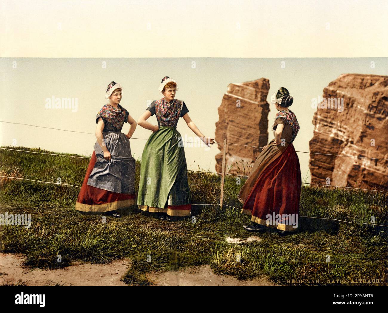 Traditional costumes, Helgoland, German Bight, ca. 1897  8333 P.Z. Helgoland, Nationaltracht. Photochrom print by Photoglob Zürich, between 1890 and 1900. Stock Photo