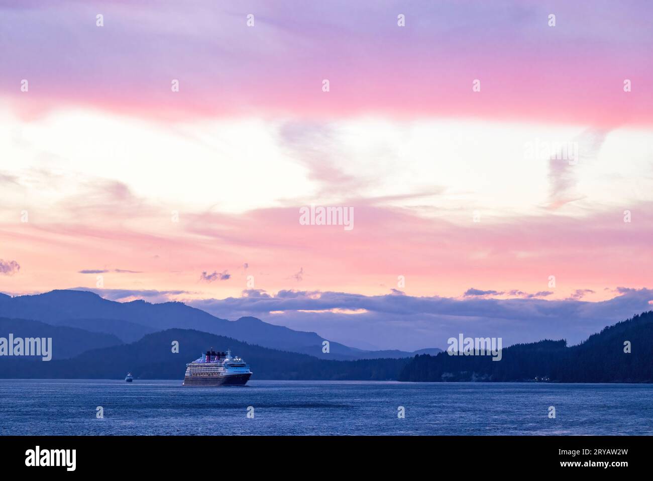 Cruise ship in the Inside Passage at sunset, Alaska, USA Stock Photo