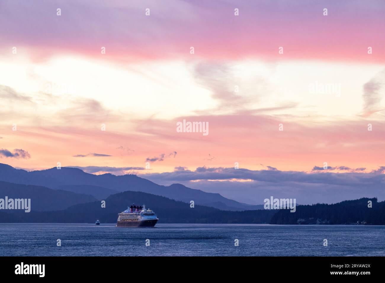 Cruise ship in the Inside Passage at sunset, Alaska, USA Stock Photo