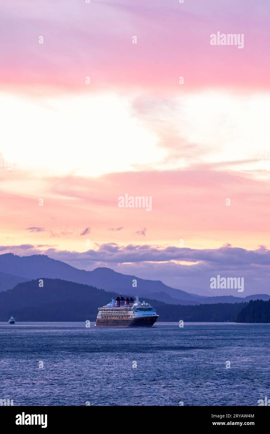 Cruise ship in the Inside Passage at sunset, Alaska, USA Stock Photo