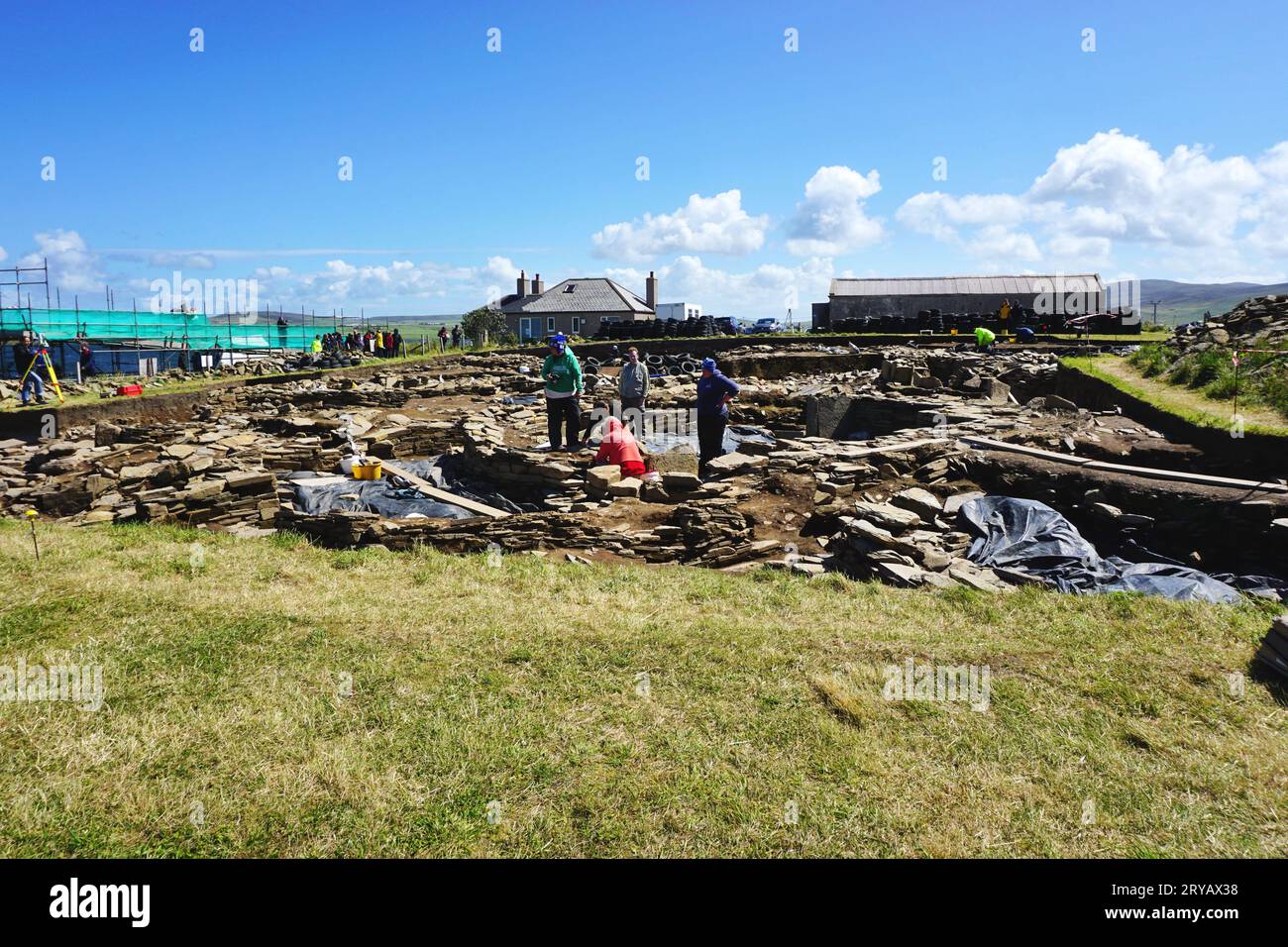 Overview of summer excavations of the ancient Neolithic archaeological site at the Ness of Brodgar on Orkney Island, off the north coast of Scotland Stock Photo