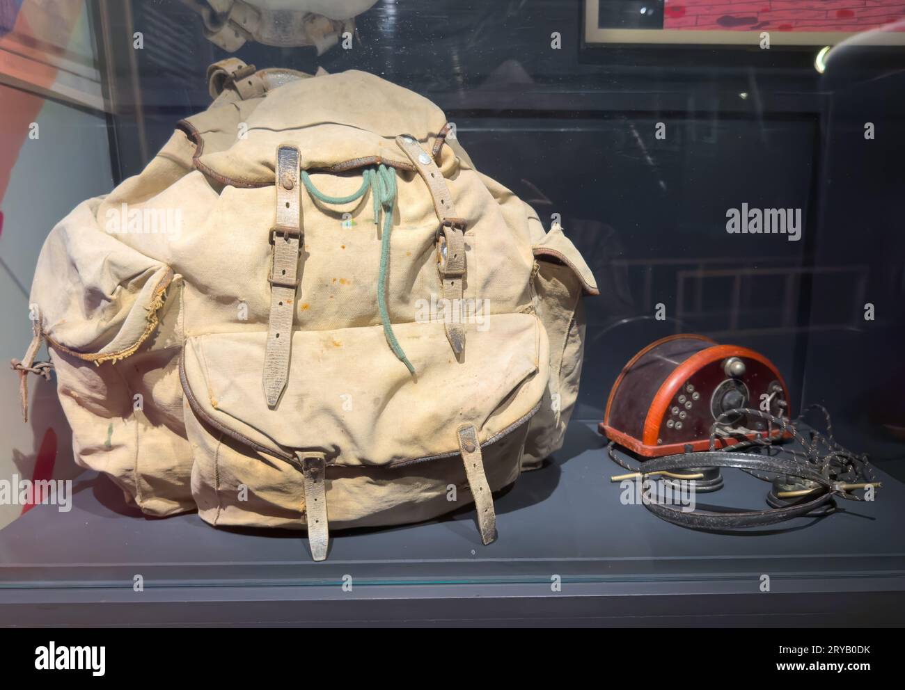 A canvas rucksack and radio equipment used by the French Resistance in WW2 on display at the  Resistance and Deportation Museum, Grenoble, France. Stock Photo