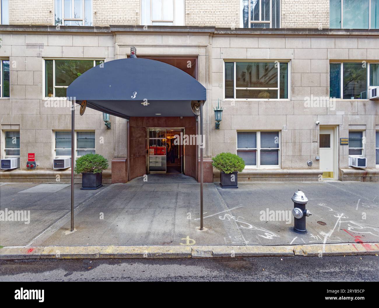 Emery Roth-designed 3 East 71st Street in Lenox Hill was built in 1944 in a modern style with very little ornamentation; it is now a co-op building. Stock Photo