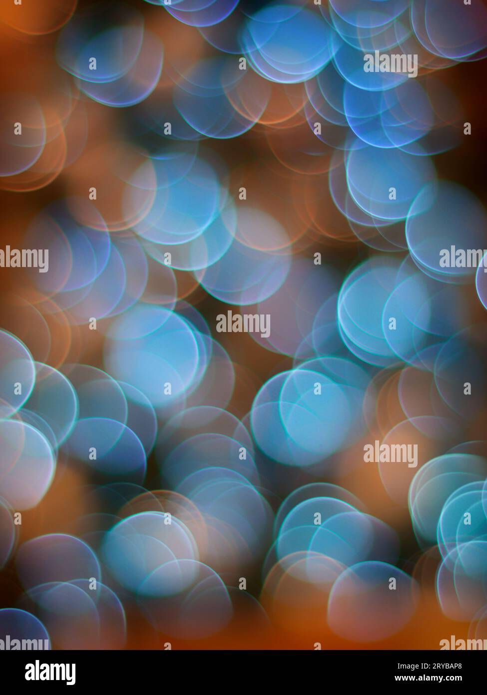 Vertical abstract background with light blue bokeh bubbles Stock Photo ...