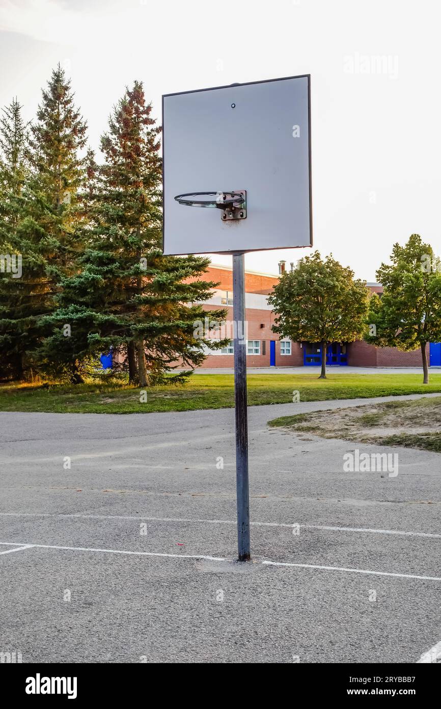 outdoor basketball court in an elementary school courtyard Stock Photo