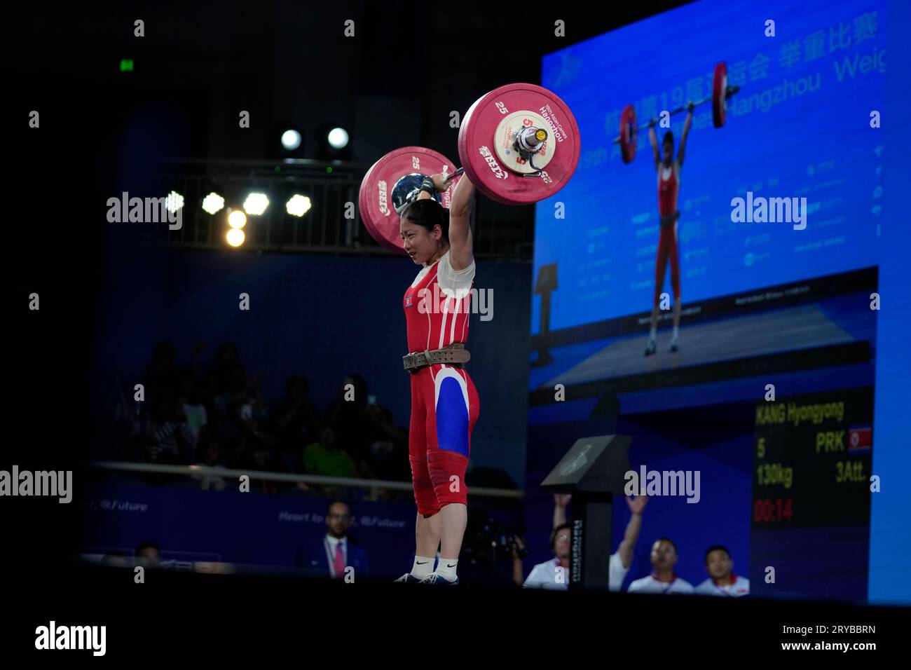 North Korea's Hyongyong Kang competes in the women's 55kg Group A ...