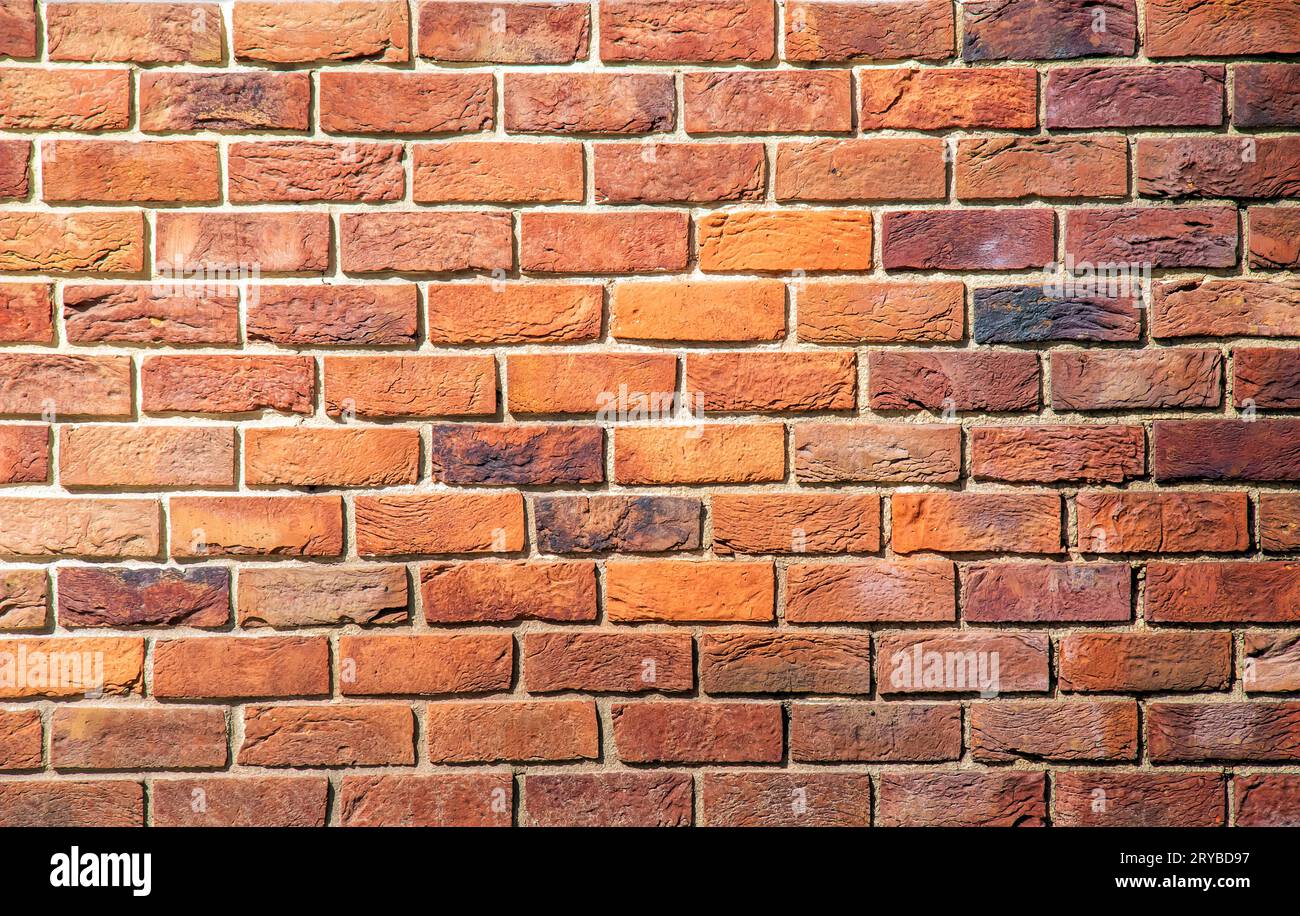Brick tile wall abstract background. Exterior view of a house made of