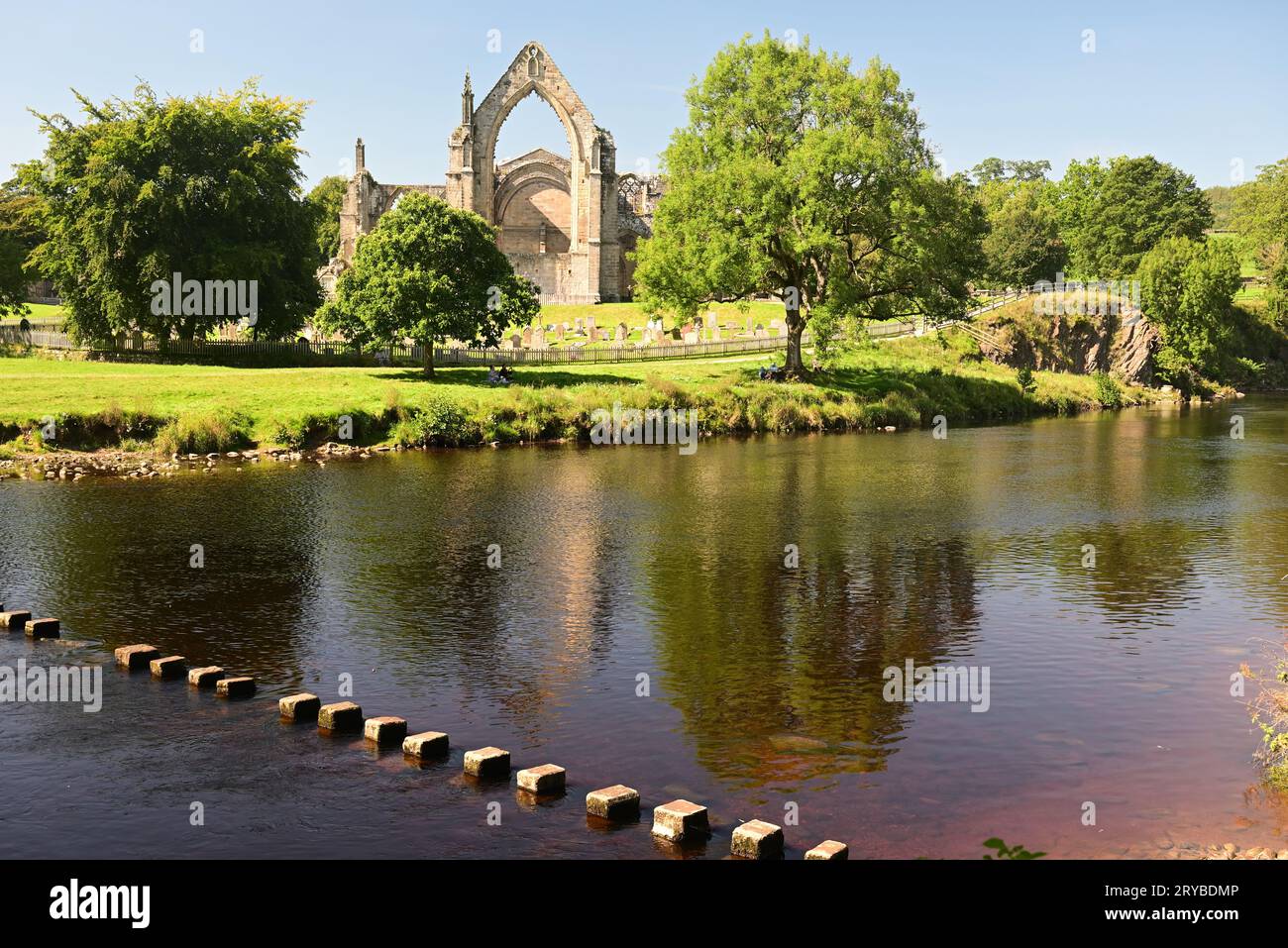 Stone Priory Stepping stones across the river Wharfe beside the ruins of Bolton ...