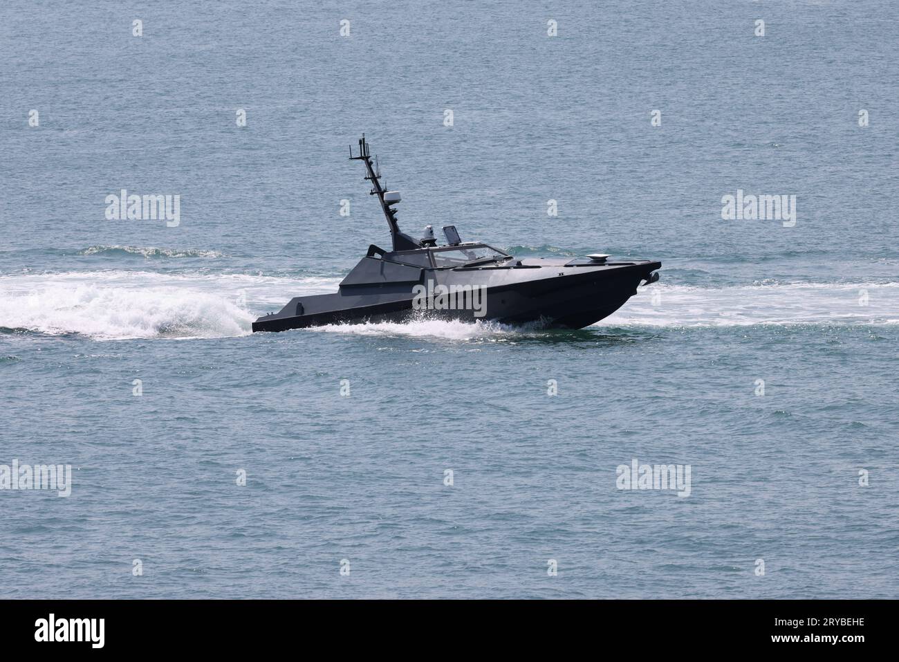 The Royal Navy autonomous surface trials vessel MADFOX returns to the Naval Base Stock Photo