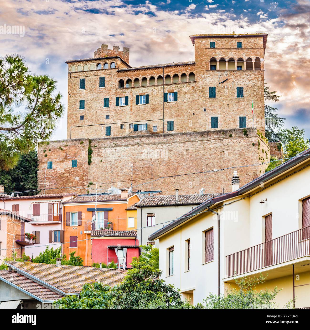 Castle overlooking the colorful houses Stock Photo