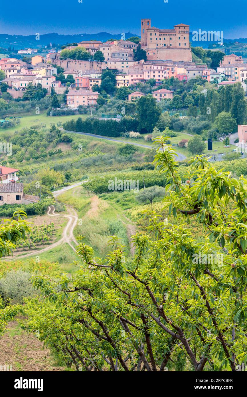 Medieval village and cultivated fields in the hills Stock Photo