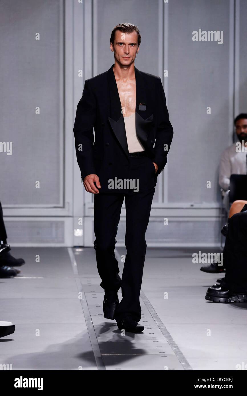 A model walks on the runway at the Coperni fashion show during the