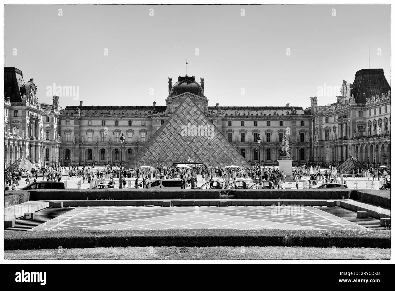World famous Love Museum pyramid acoss the courtyard. Paris, France Stock Photo