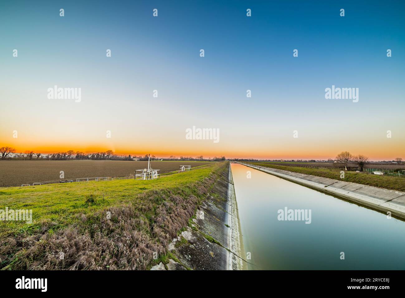 Water canal and agriculture Stock Photo