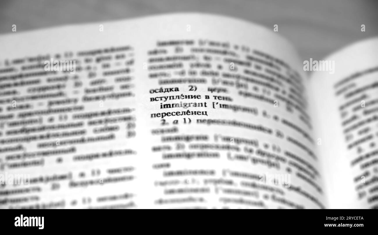 Immigrant Definition Word Text in Dictionary Page. Shallow depth of