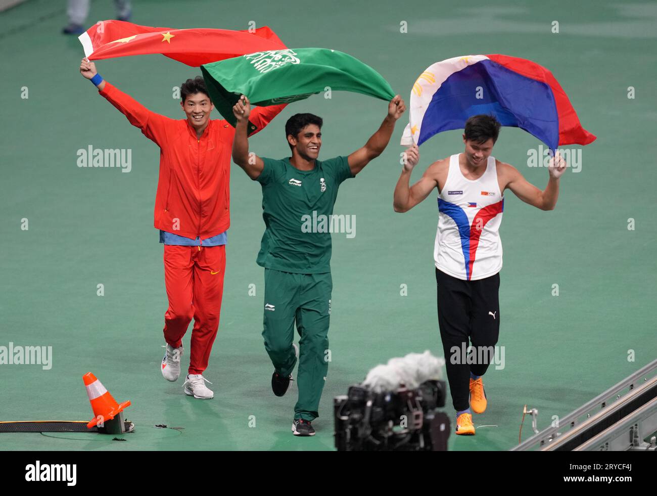 Hangzhou, China's Zhejiang Province. 30th Sep, 2023. Huang Bokai of China(L), Ernest John Obiena(R) of the Philippines and Hussain Asim M Al Hizam of Saudi Arabia react after the Men's Pole Vault of Athletics at the 19th Asian Games in Hangzhou, east China's Zhejiang Province, Sept. 30, 2023. Credit: Jiang Wenyao/Xinhua/Alamy Live News Stock Photo