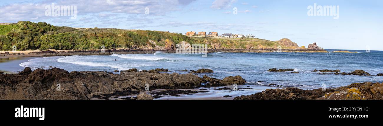 Panoramic view of Coldingham bay with surf rolling in, on the Scottish Borders, Scotland on 21 September 2023 Stock Photo