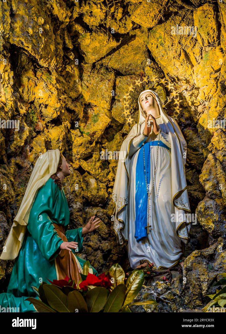 The Blessed Virgin Mary in the grotto at Lourdes Stock Photo